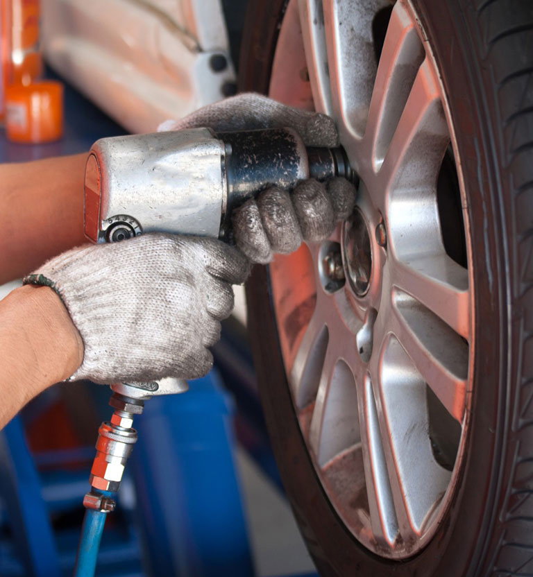 Cropped hands of mechanic